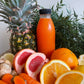 cold pressed juice cleanse orange pineapple grapefruit carrot ginger turmeric lemon juice cleanse coastal berry central coast nsw